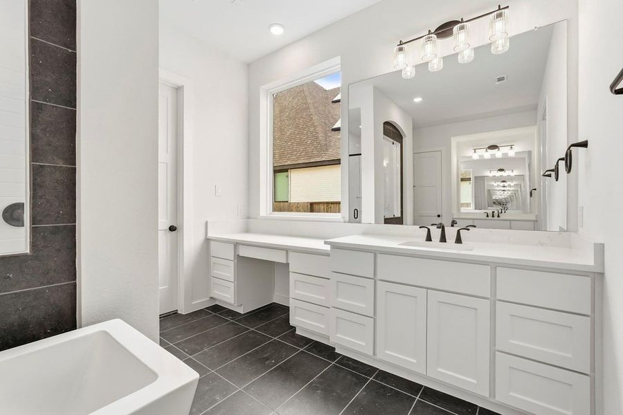 Vanity area with mirrors
