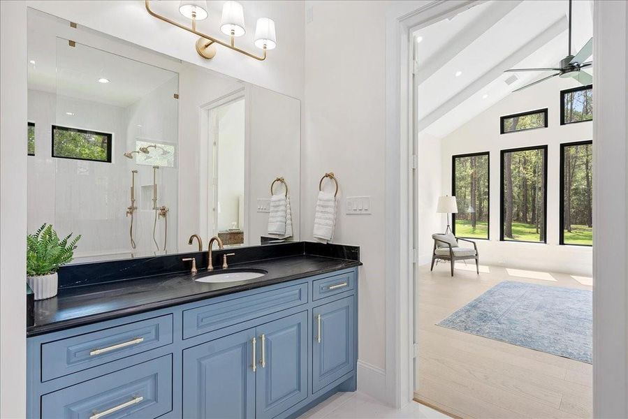 The primary bath is more than beautiful; it feels like a private ritual, a place to slow down, breathe deeper, and have a few moments that belong only to you.