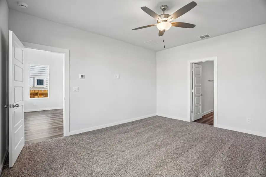 Spacious, unfurnished interior of a new home in The Meadows at Hunters Ranch, San Antonio (Image 24).