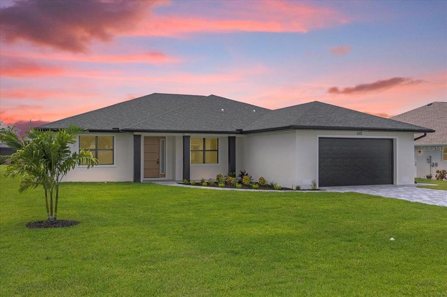 Front exterior of a new home in , Rotonda West, FL, highlighting curb appeal (Image 2).