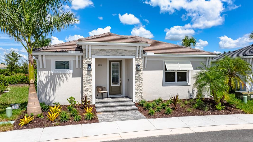 Representative exterior photo of a completed home built from the Lucca by Taylor Morrison in Esplanade at Azario Lakewood Ranch, Lakewood Ranch, FL (Image 2).
