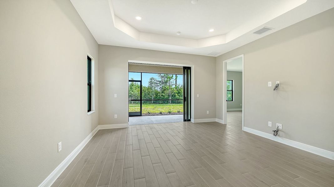 Spacious, unfurnished interior of a new home in Vicenza Real Estate and Homes for Sale in North Venice, FL - Neal Communities, Venice (Image 18).