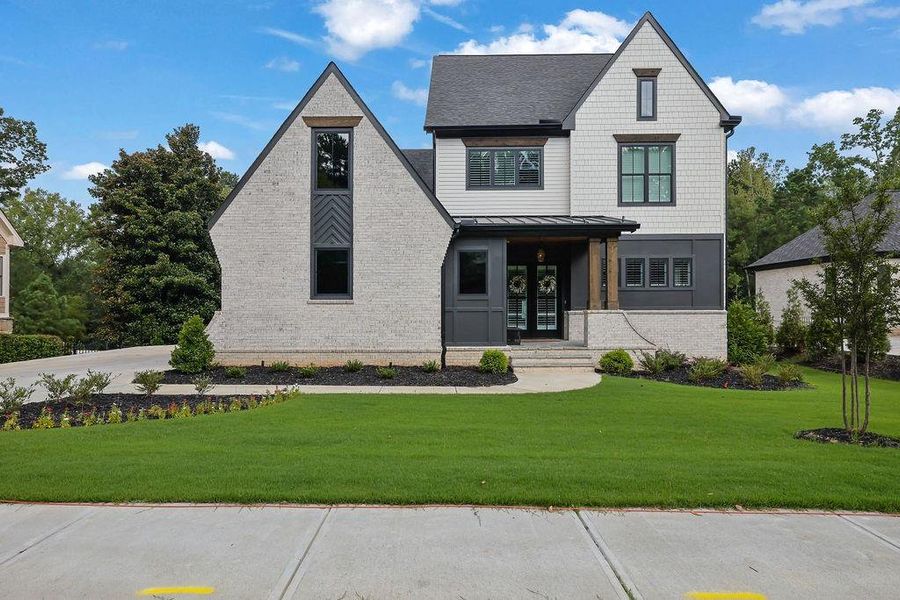 Front exterior of a new home in , Acworth, GA, highlighting curb appeal (Image 26). Front exterior of a new home in , Acworth, GA, highlighting curb appeal (Image 26).