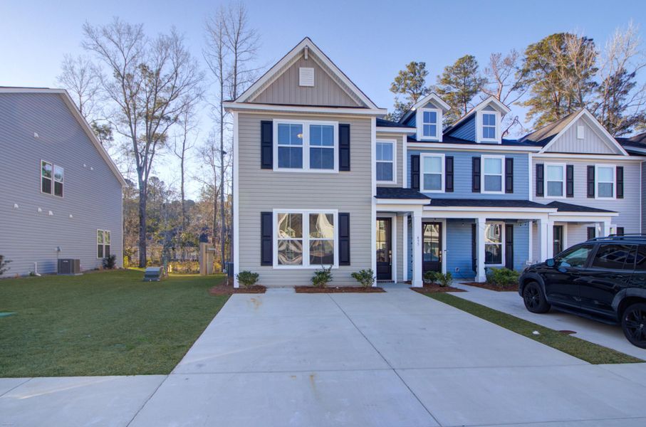 Front exterior of a new home in , Summerville, SC, highlighting curb appeal (Image 26).