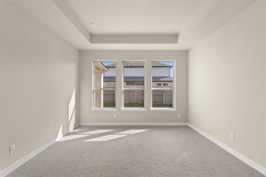 Your secondary bedroom features plush carpet, fresh paint, closet, and a large window that lets in plenty of natural lighting.