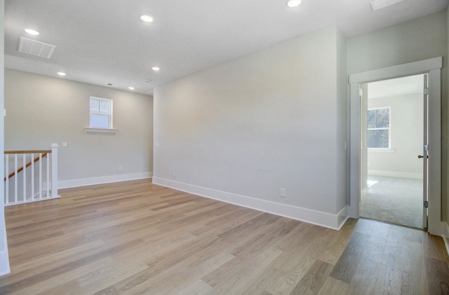 Spacious, unfurnished interior of a new home in Indigo Grove Single Family Homes, Johns Island (Image 35).