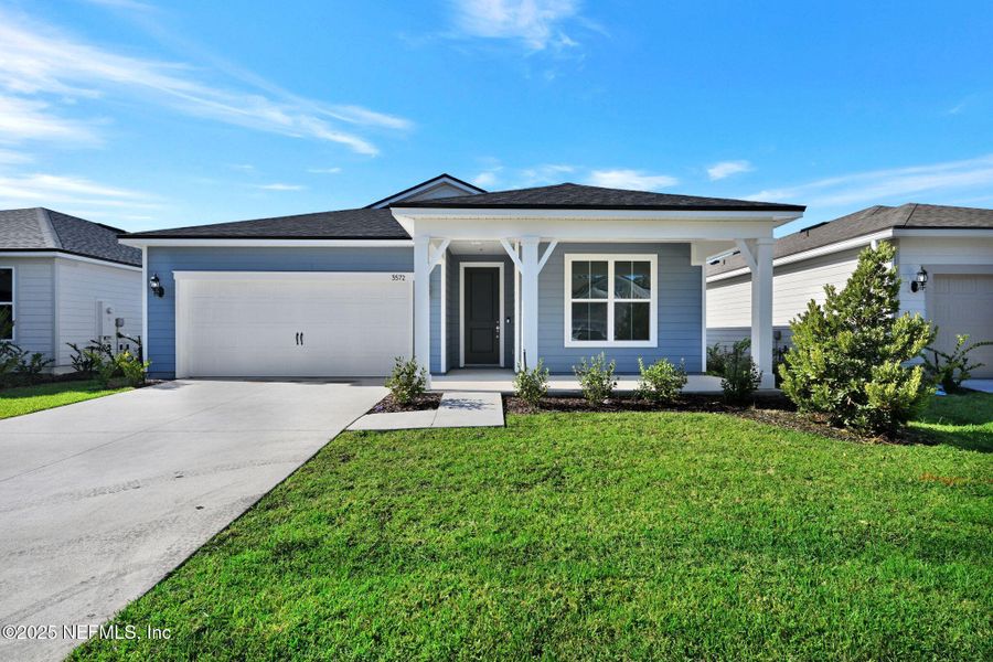 Front exterior of a new home in Hyland Trail, Green Cove Springs, FL, highlighting curb appeal (Image 13). Front exterior of a new home in Hyland Trail, Green Cove Springs, FL, highlighting curb appeal (Image 13).