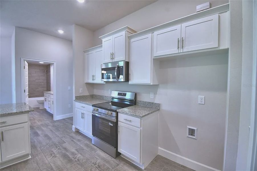 Furnished interior view inside a new home in Lake Juliana Estates, Auburndale (Image 7).