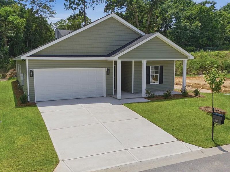 Front exterior of a new home in Emanuel Creek, West Columbia, SC, highlighting curb appeal (Image 1). Front exterior of a new home in Emanuel Creek, West Columbia, SC, highlighting curb appeal (Image 1).