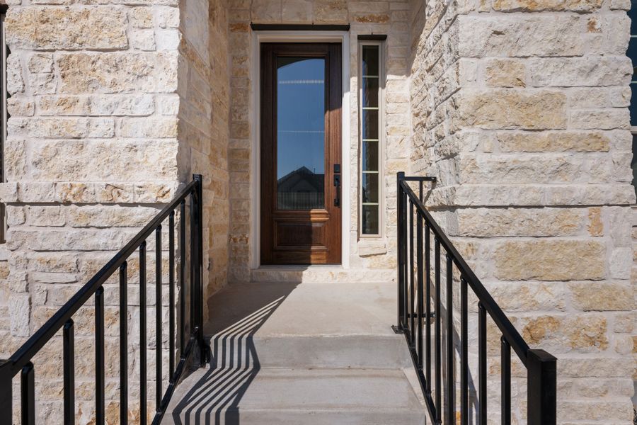 Representative exterior photo of a completed home built from the Maxwell by Ashton Woods in The Estates at La Cima, San Marcos, TX (Image 27). Representative exterior photo of a completed home built from the Maxwell by Ashton Woods in The Estates at La Cima, San Marcos, TX (Image 27).