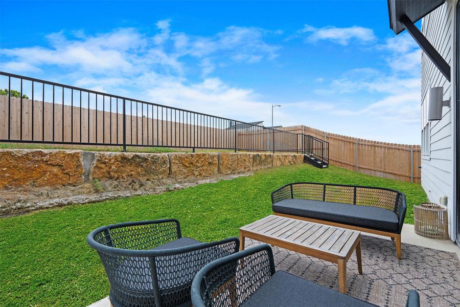 The terraced yard is perfect for having multiple entertaining areas.