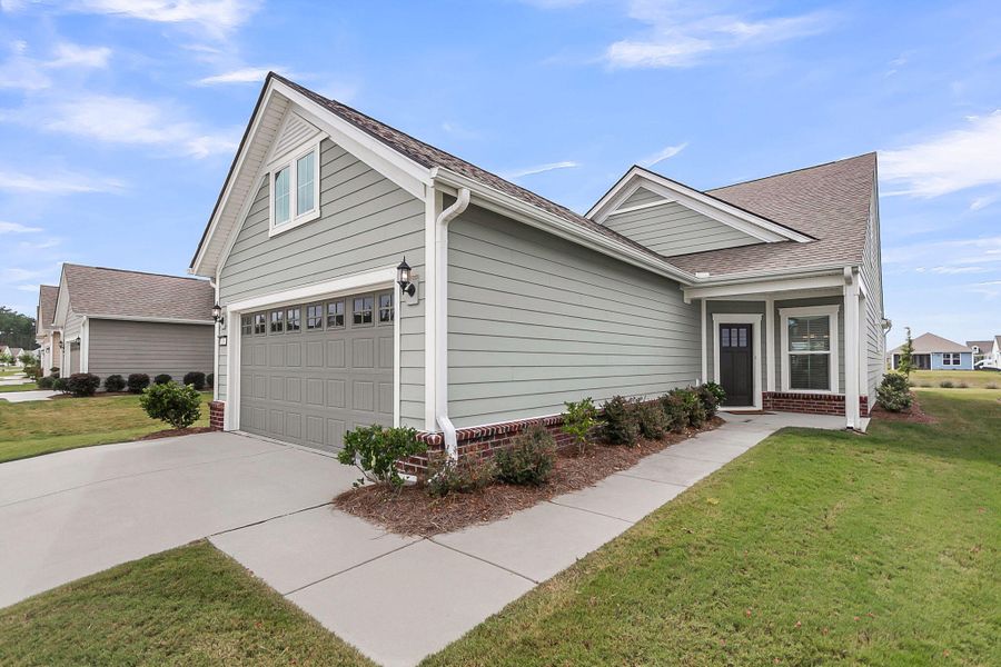 Front exterior of a new home in , Summerville, SC, highlighting curb appeal (Image 30).