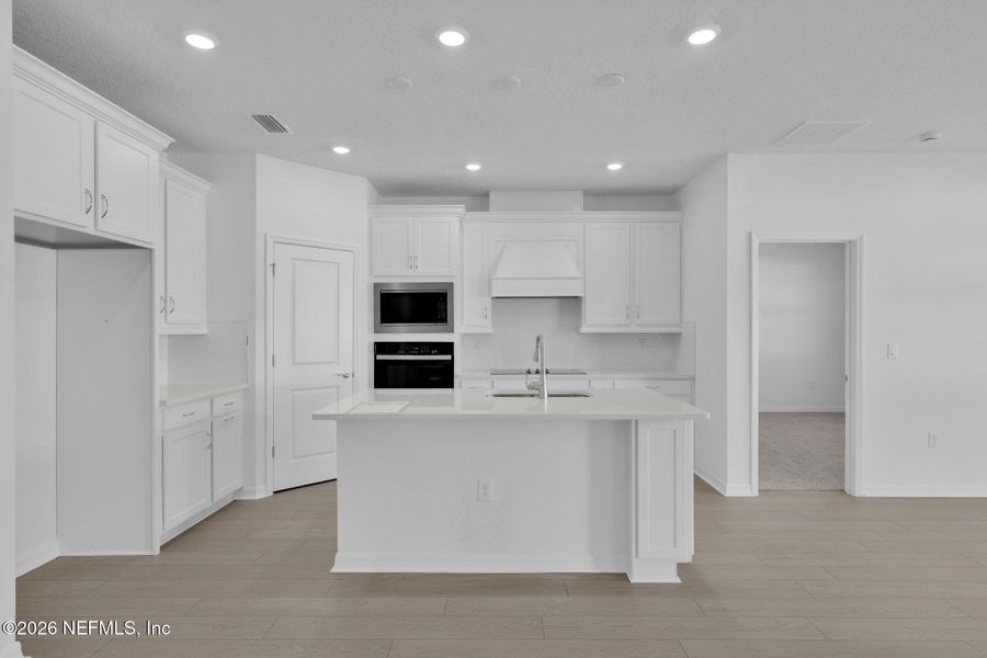 Furnished interior view inside a new home in Hyland Trail, Green Cove Springs (Image 13).