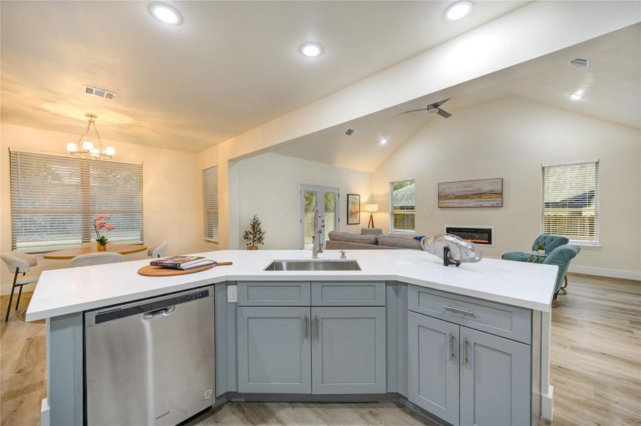 Bright, open kitchen seamlessly connects to the living area, perfect for entertaining.
