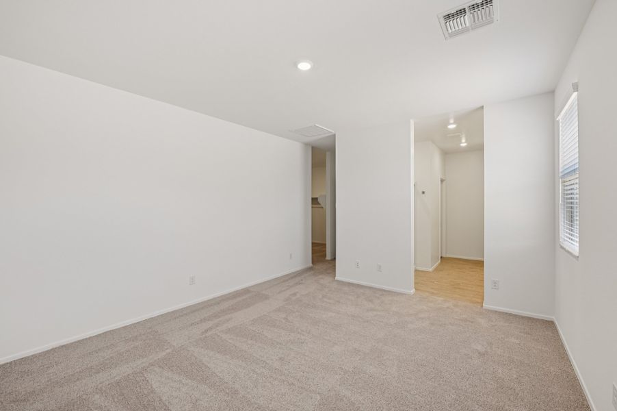 Primary suite. Finishes and options may vary by community