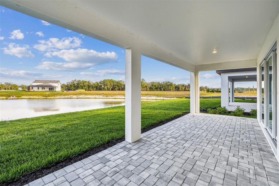 Exterior details and patio area of a home in Creeks Edge at Twin Rivers, Parrish (Image 3).