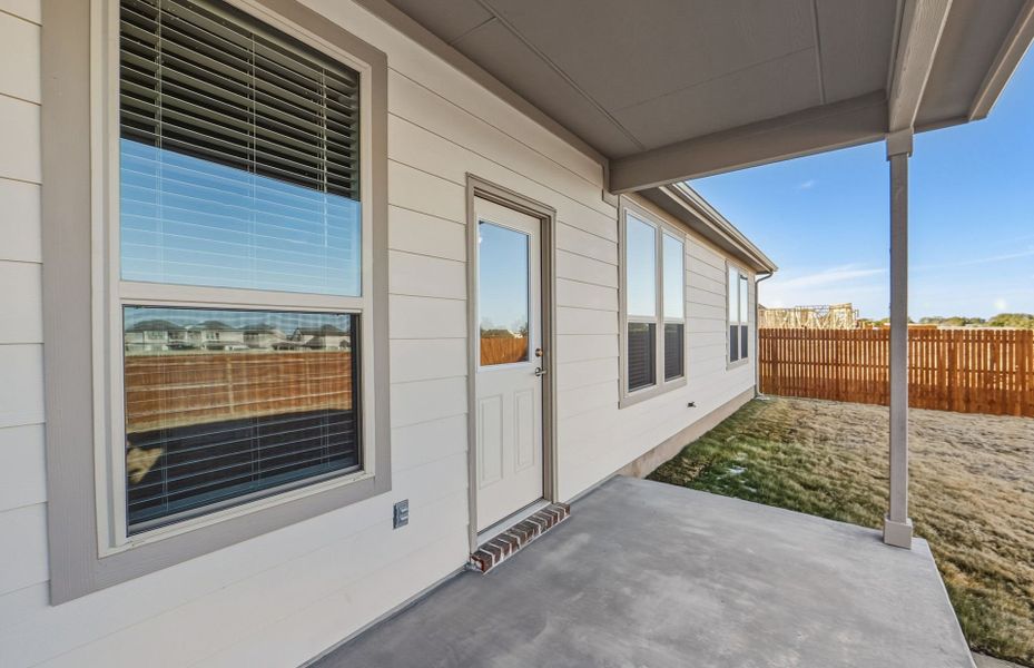 Exterior details and patio area of a home in Saddleback at Santa Rita Ranch, Liberty Hill (Image 4).
