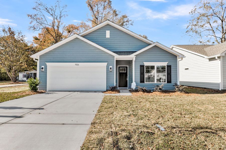 Front exterior of a new home in , Charleston, SC, highlighting curb appeal (Image 23).