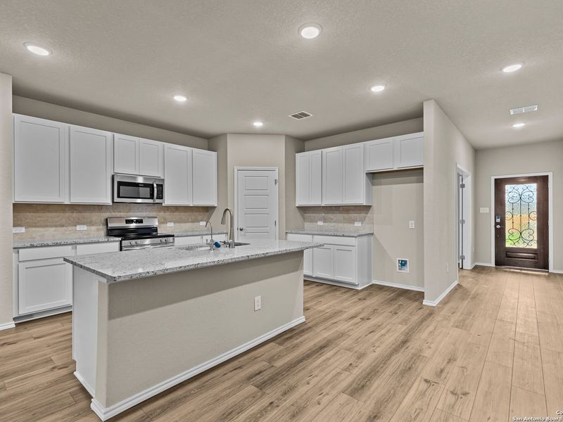 Furnished interior view inside a new home in Royal Crest, San Antonio (Image 7).