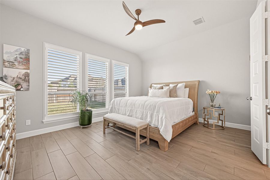 Featuring elegant plantation shutters consistent with the home’s primary living areas, this space offers sophisticated light control and a polished, cohesive aesthetic. (Note: Photo is staged; property is currently vacant.) Featuring elegant plantation shutters consistent with the home’s primary living areas, this space offers sophisticated light control and a polished, cohesive aesthetic. (Note: Photo is staged; property is currently vacant.)