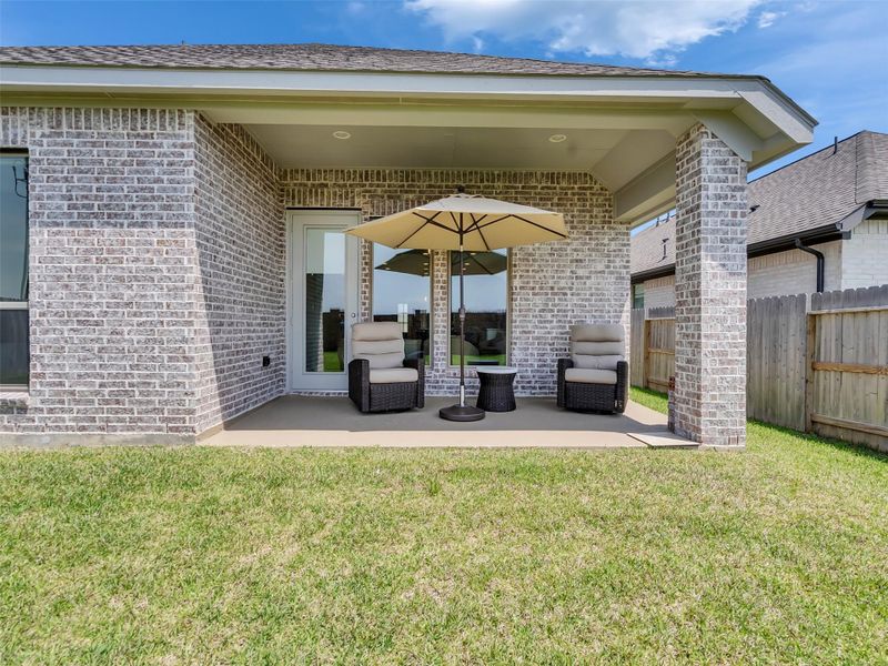 Exterior details and patio area of a home in Marvida, Cypress (Image 4).