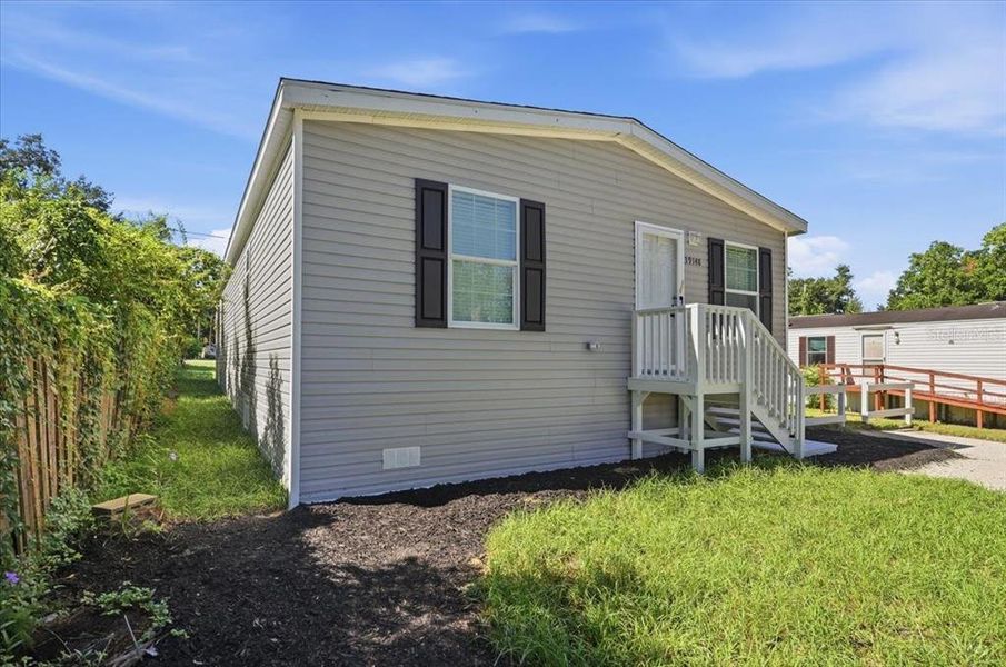 Exterior details and patio area of a home in , Zephyrhills (Image 19).