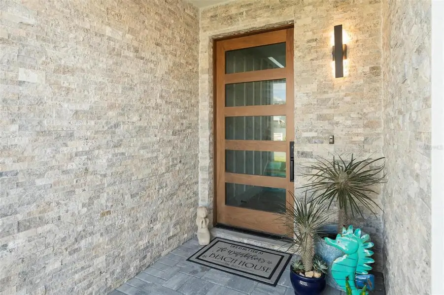 Exterior details and patio area of a home in , Madeira Beach (Image 30).