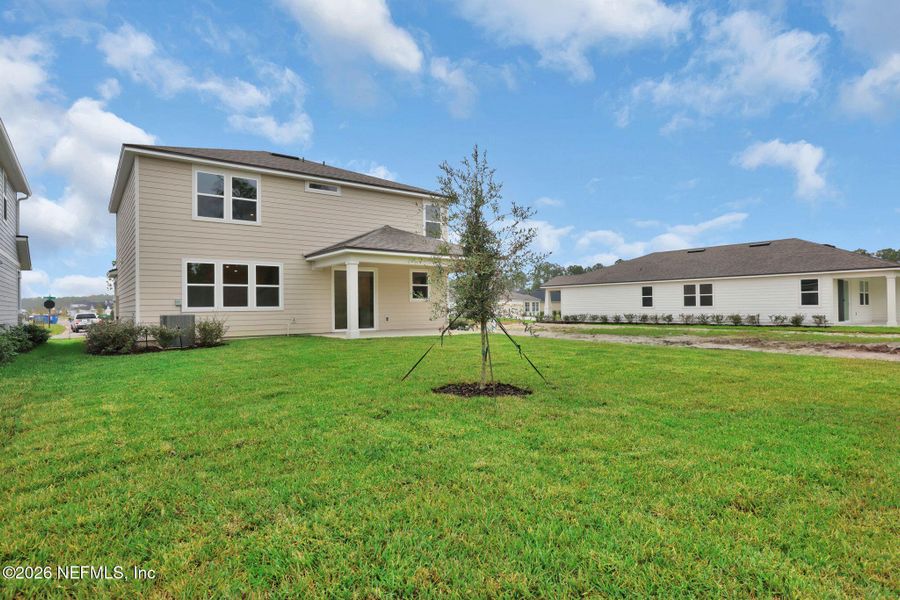 Exterior details and patio area of a home in Hyland Trail, Green Cove Springs (Image 28).