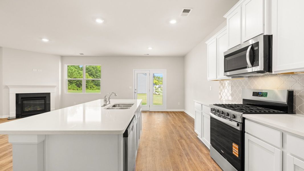 Representative furnished interior of a home built from the Elle by D.R. Horton in Preserve at Dove Creek, Statham (Image 7).