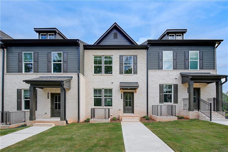 Front exterior of a new home in Daybreak, Newnan, GA, highlighting curb appeal (Image 18). Front exterior of a new home in Daybreak, Newnan, GA, highlighting curb appeal (Image 18).