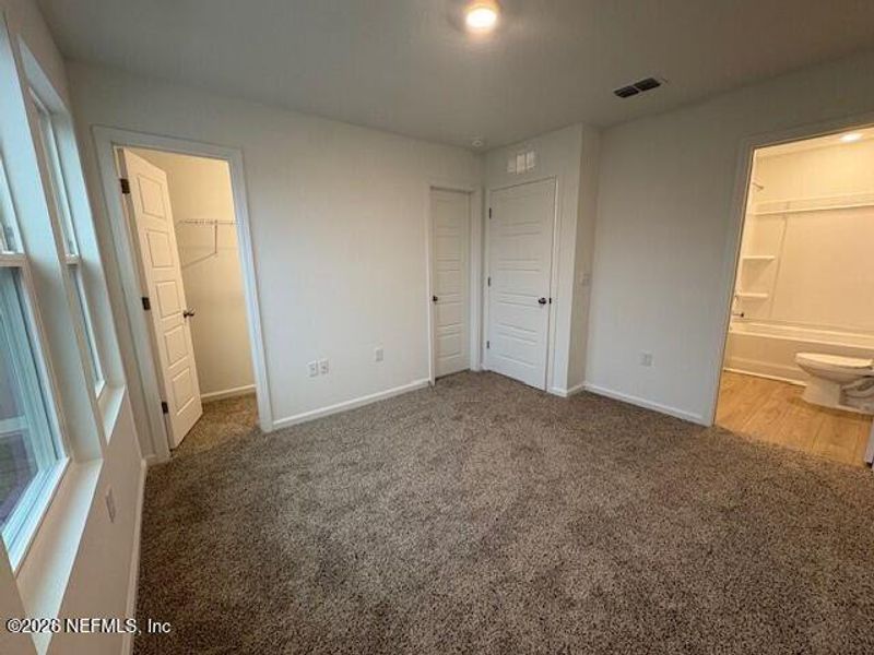 Spacious, unfurnished interior of a new home in Cordera Townhomes, St. Augustine (Image 21).