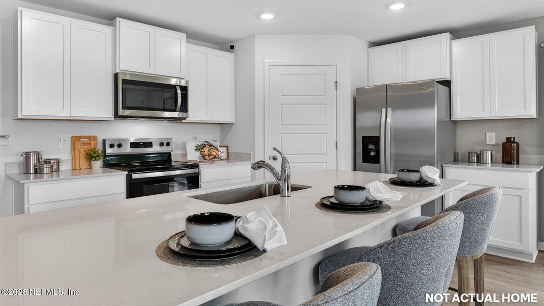 Furnished interior view inside a new home in Sawmill Branch, Palm Coast (Image 30). Furnished interior view inside a new home in Sawmill Branch, Palm Coast (Image 30).