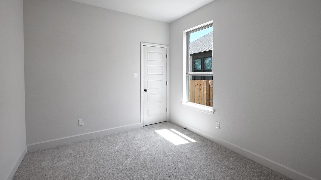 Spacious, unfurnished interior of a new home in 6 Creeks, Kyle (Image 13).