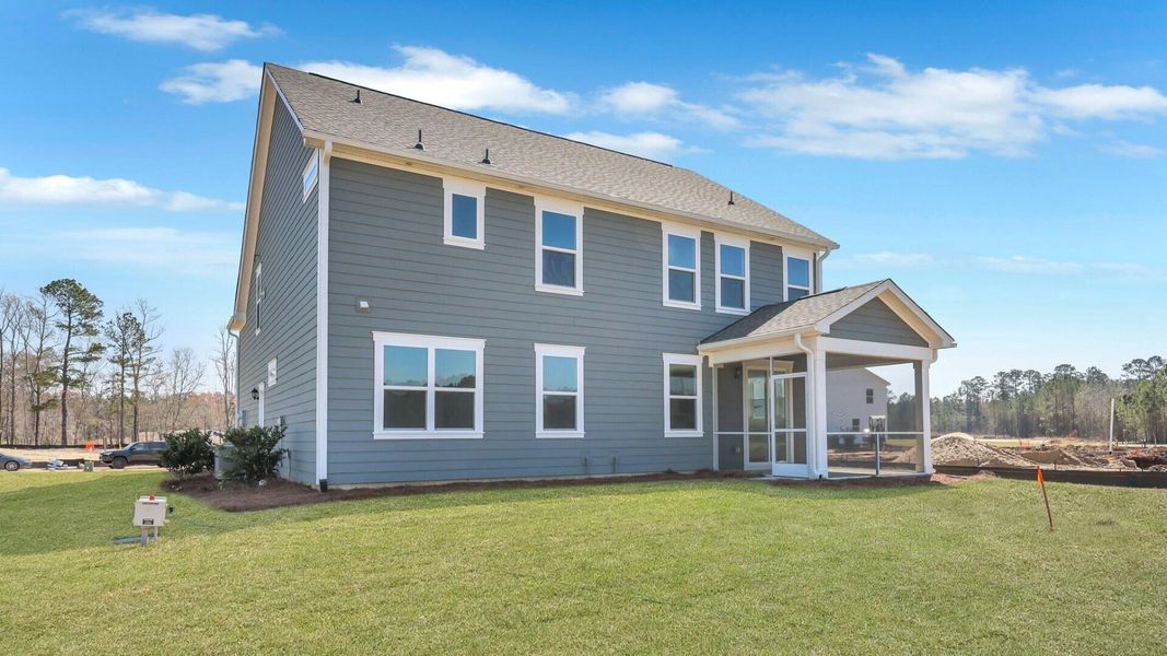 Front exterior of a new home in Berkeley Bay, Ridgeville, SC, highlighting curb appeal (Image 24).