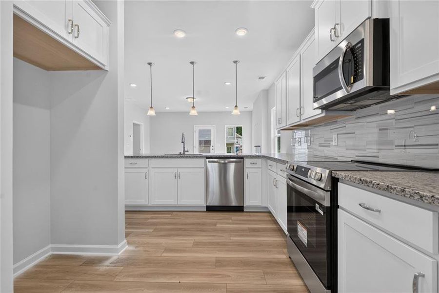 Furnished interior view inside a new home in Sycamore Crest, Calhoun (Image 4).