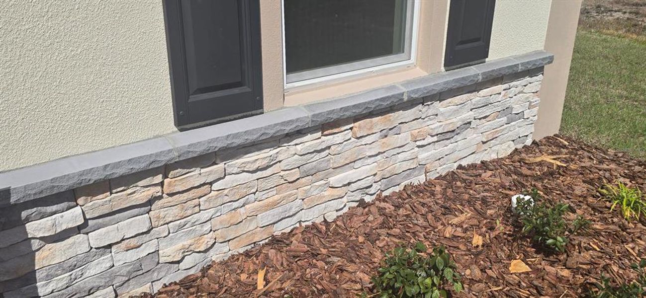 Exterior details and patio area of a home in Poinciana, Poinciana (Image 10).
