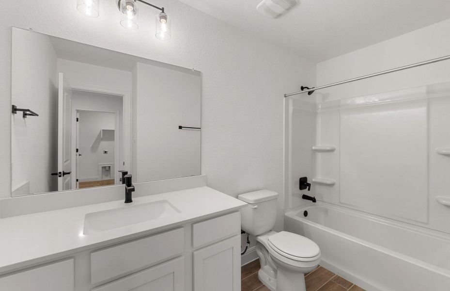 Furnished interior view inside a new home in Horizon Lake, Leander (Image 7).