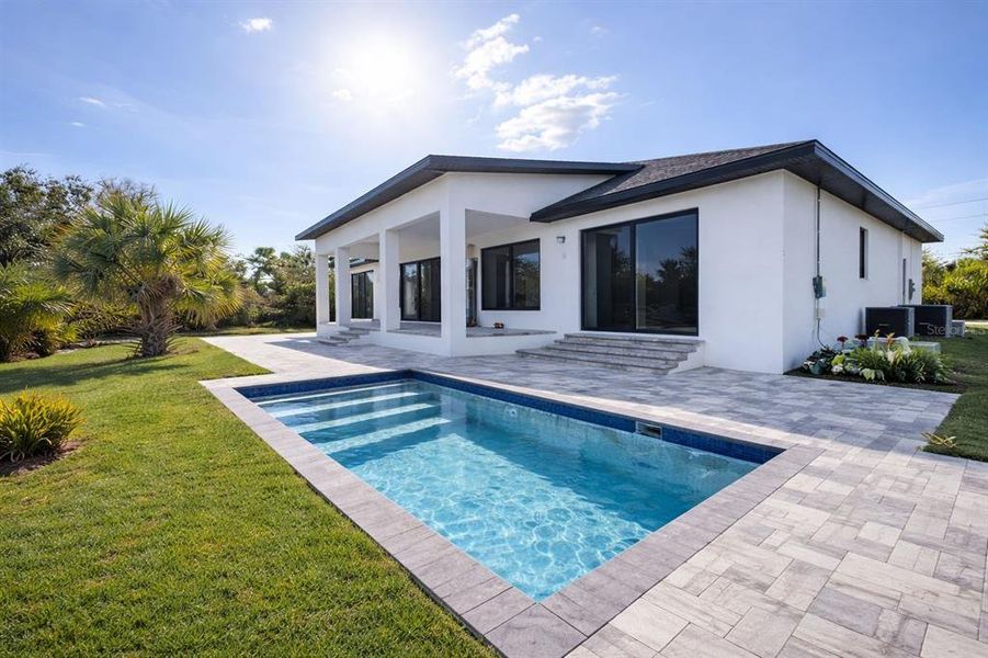 Exterior details and patio area of a home in , Port Charlotte (Image 20).