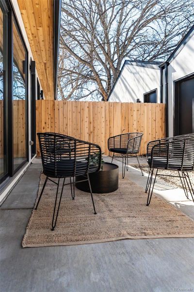 Exterior details and patio area of a home in , Englewood (Image 25).