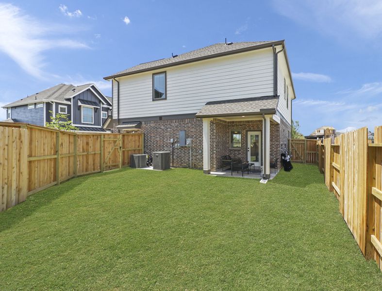 Exterior details and patio area of a home in Elyson, Katy (Image 3). Exterior details and patio area of a home in Elyson, Katy (Image 3).