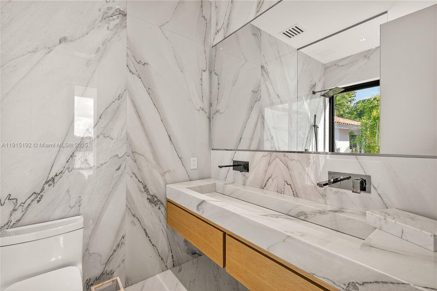 Furnished interior view inside a new home in , Miami Beach (Image 15). Furnished interior view inside a new home in , Miami Beach (Image 15).