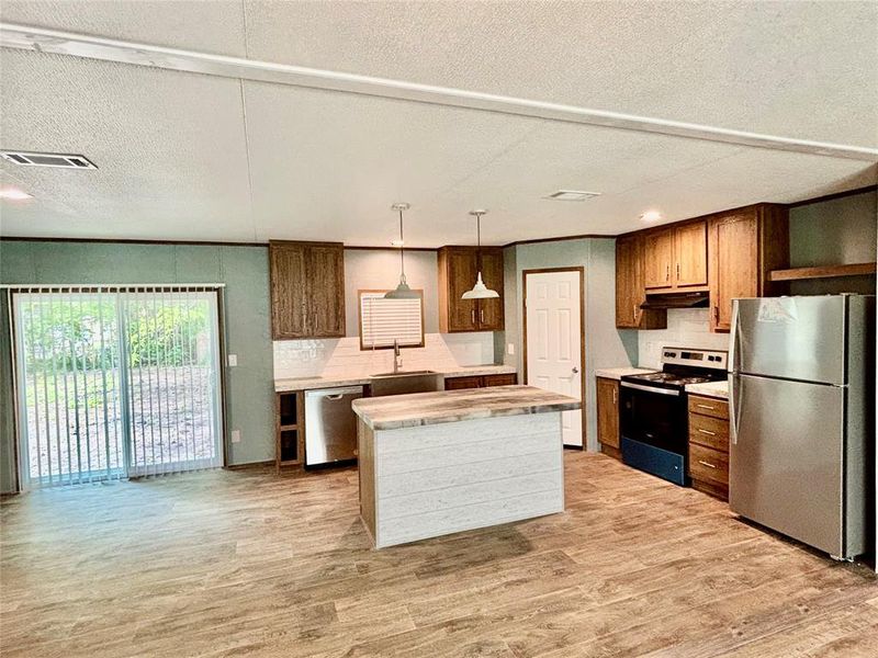 Furnished interior view inside a new home in , Quinlan (Image 6).