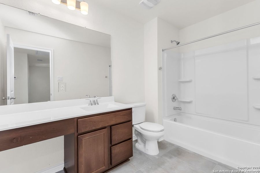 Furnished interior view inside a new home in Spanish Trails Villas, San Antonio (Image 8).