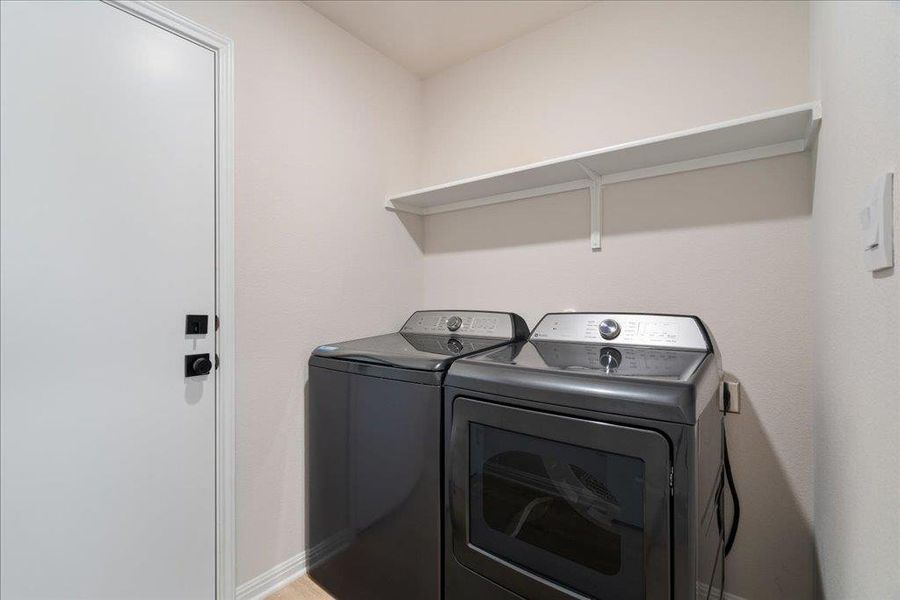 Washroom with laundry area and separate washer and dryer