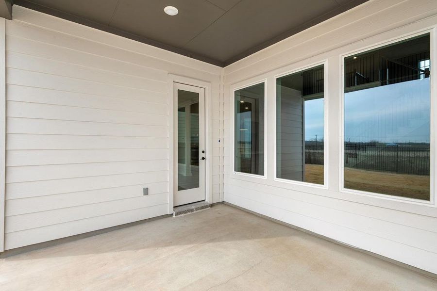 Exterior details and patio area of a home in Lagos Reserve, Manor (Image 21).