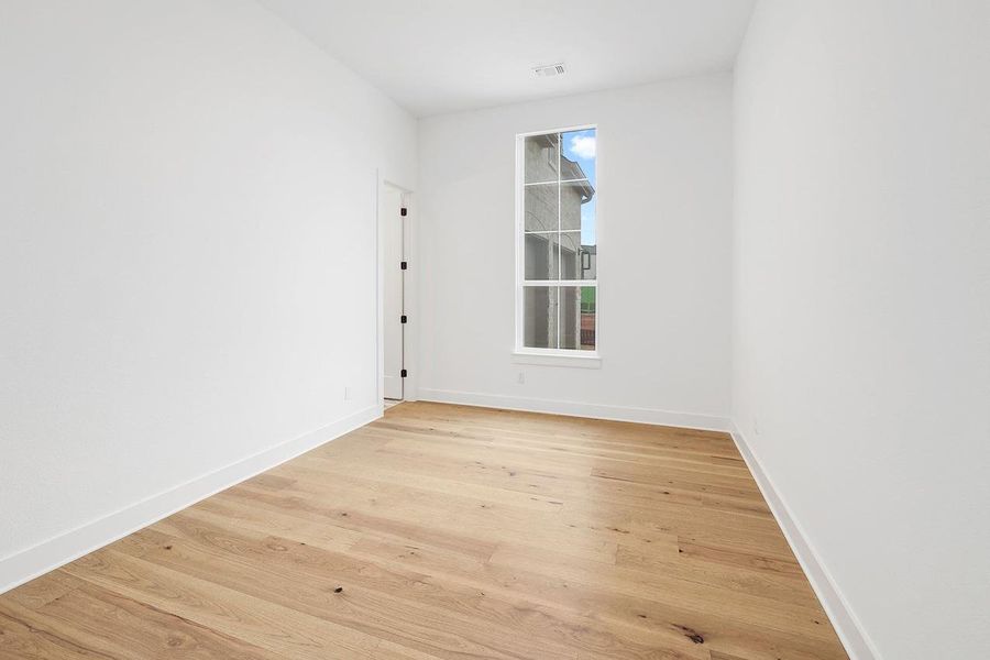 Spacious, unfurnished interior of a new home in Parkside On The River, Georgetown (Image 18).