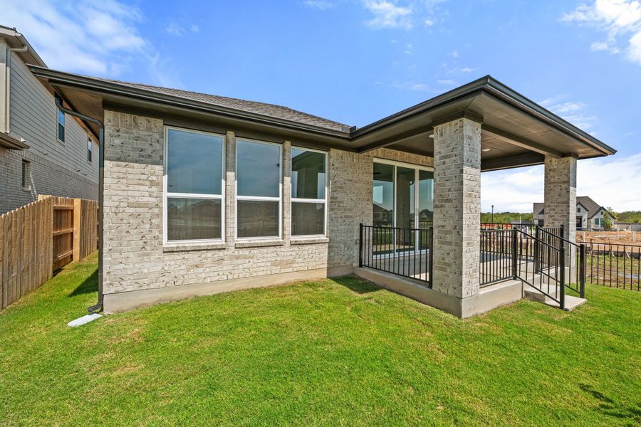 Exterior details and patio area of a home in Flora, Hutto (Image 25).