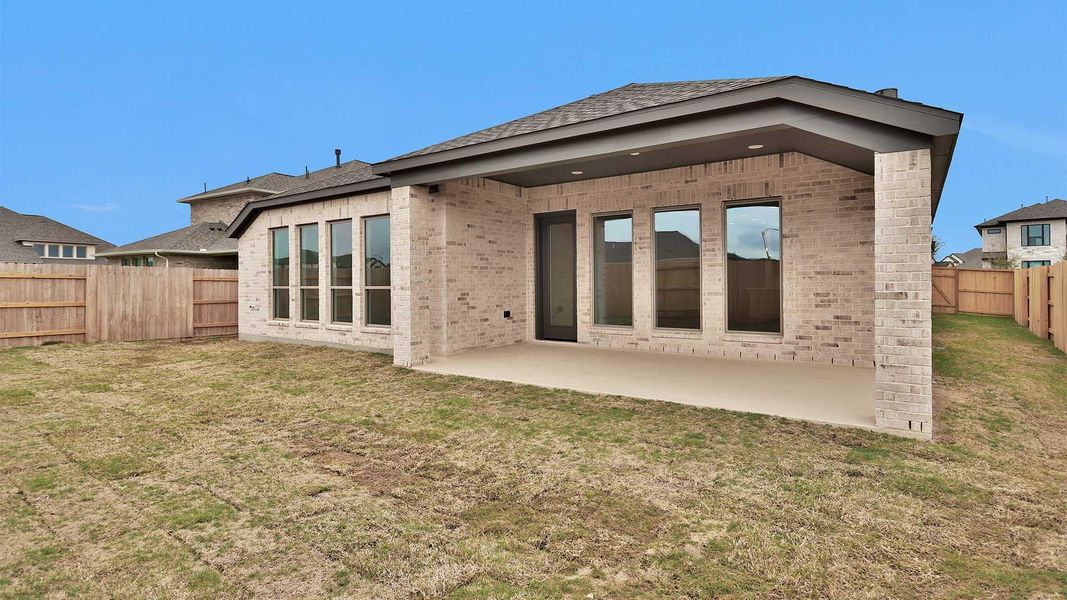 Exterior details and patio area of a home in Elyson, Katy (Image 4).