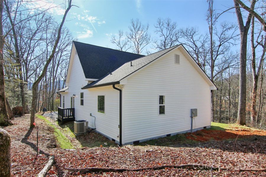 Front exterior of a new home in , Bryson City, NC, highlighting curb appeal (Image 23).