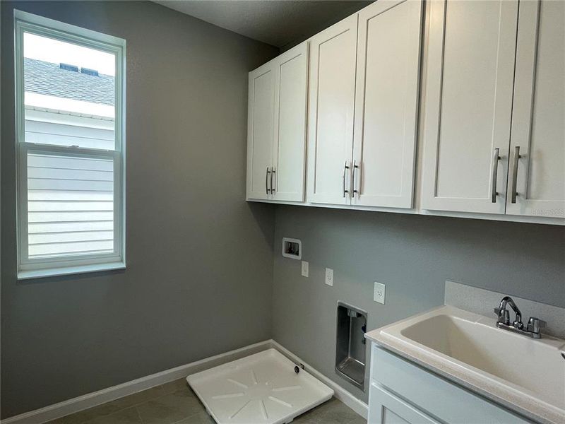 Furnished interior view inside a new home in Center Lake on the Park, St. Cloud (Image 15).